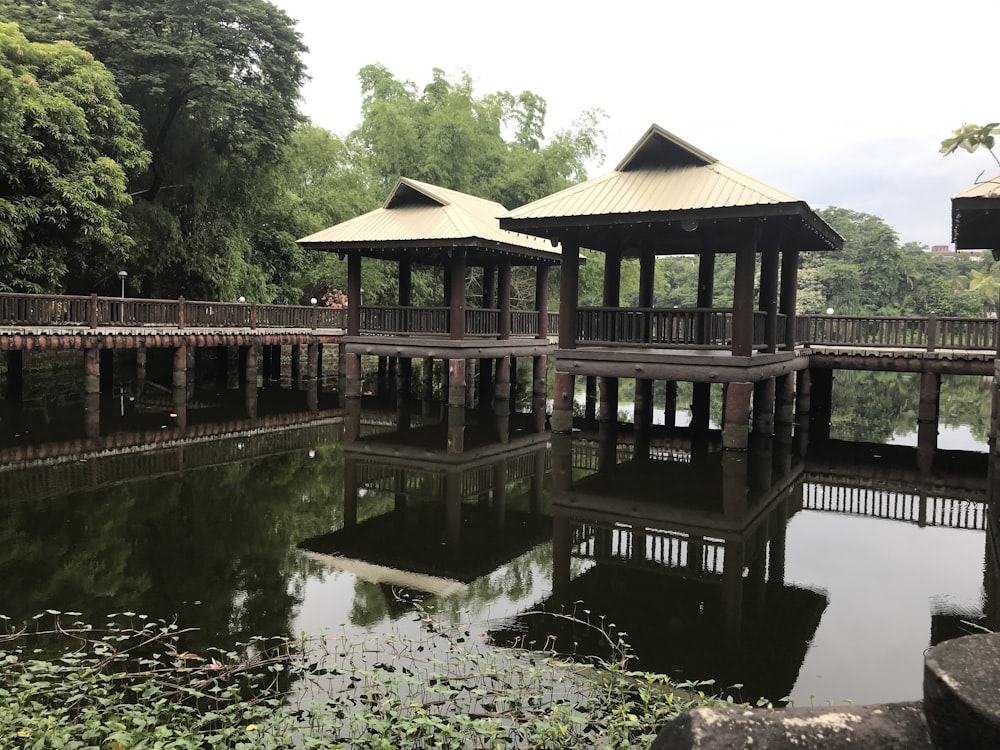 a wooden bridge over water