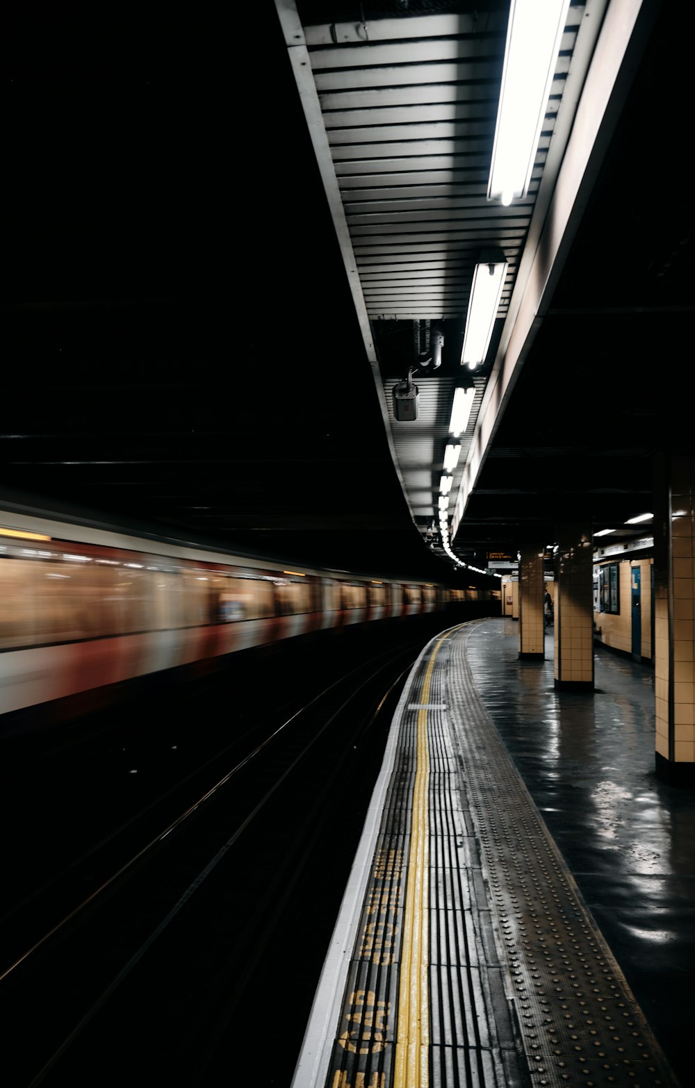 a train travels down the tracks