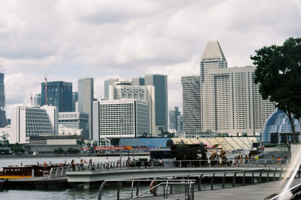 a city skyline with a river