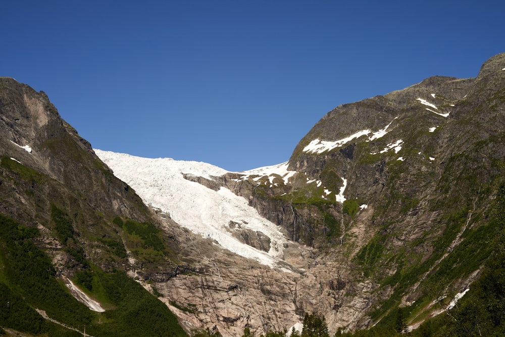 a mountain with snow