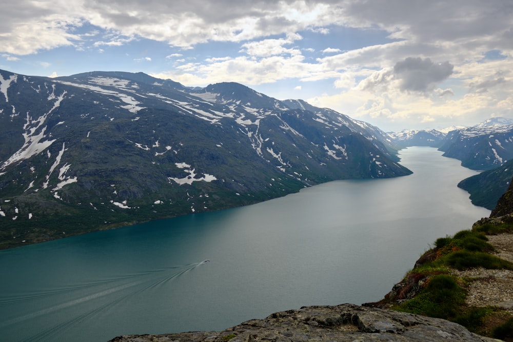 a lake surrounded by mountains