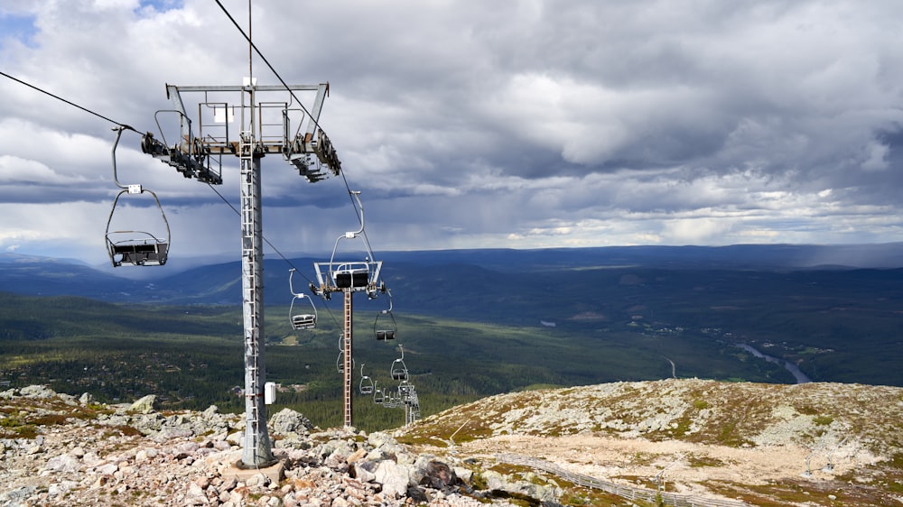 a ski lift going up a hill