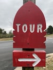 a stop sign with a white arrow