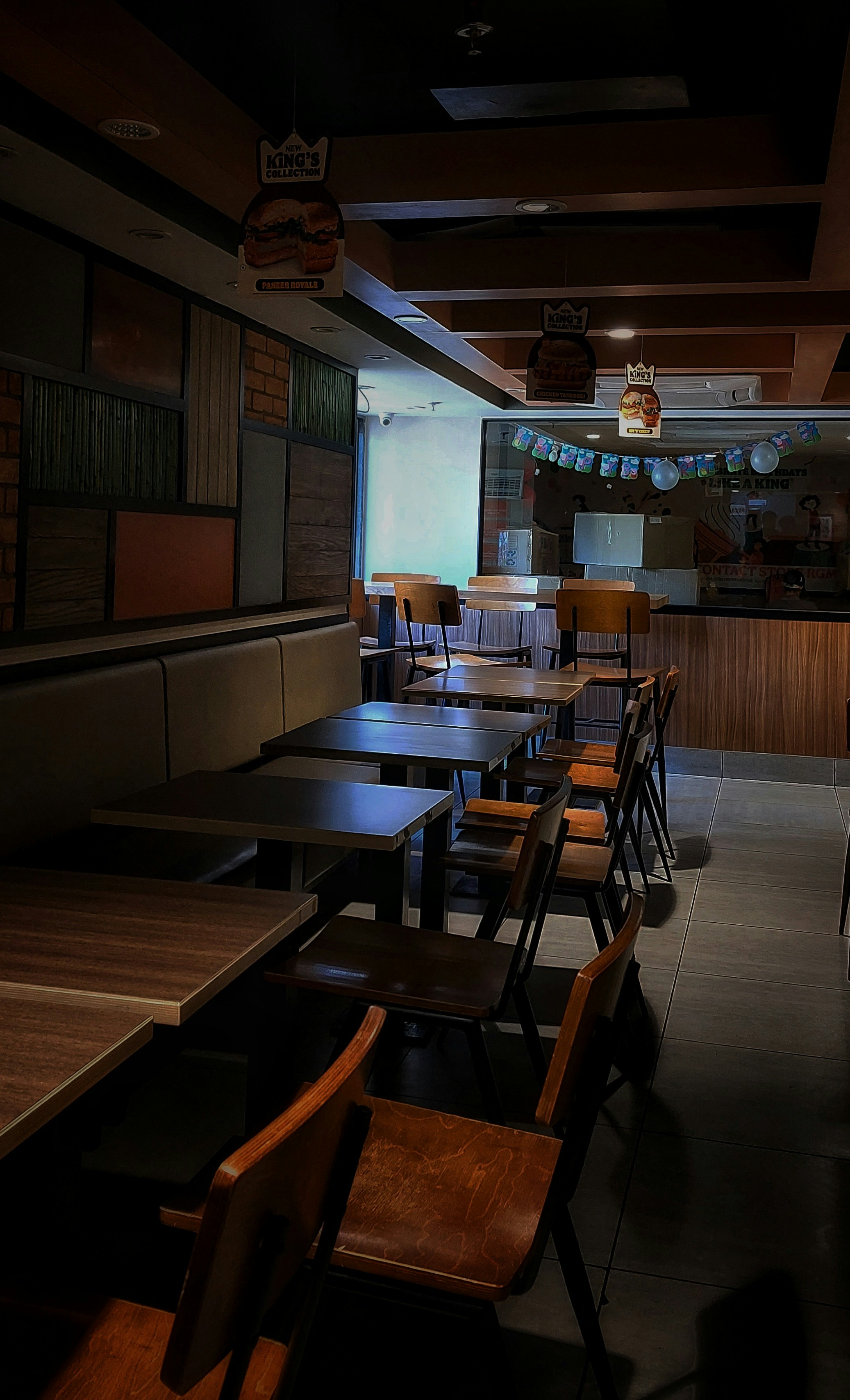 a room with tables and chairs