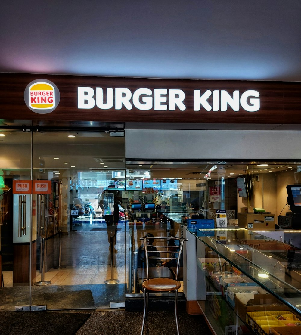 a store front with a chair