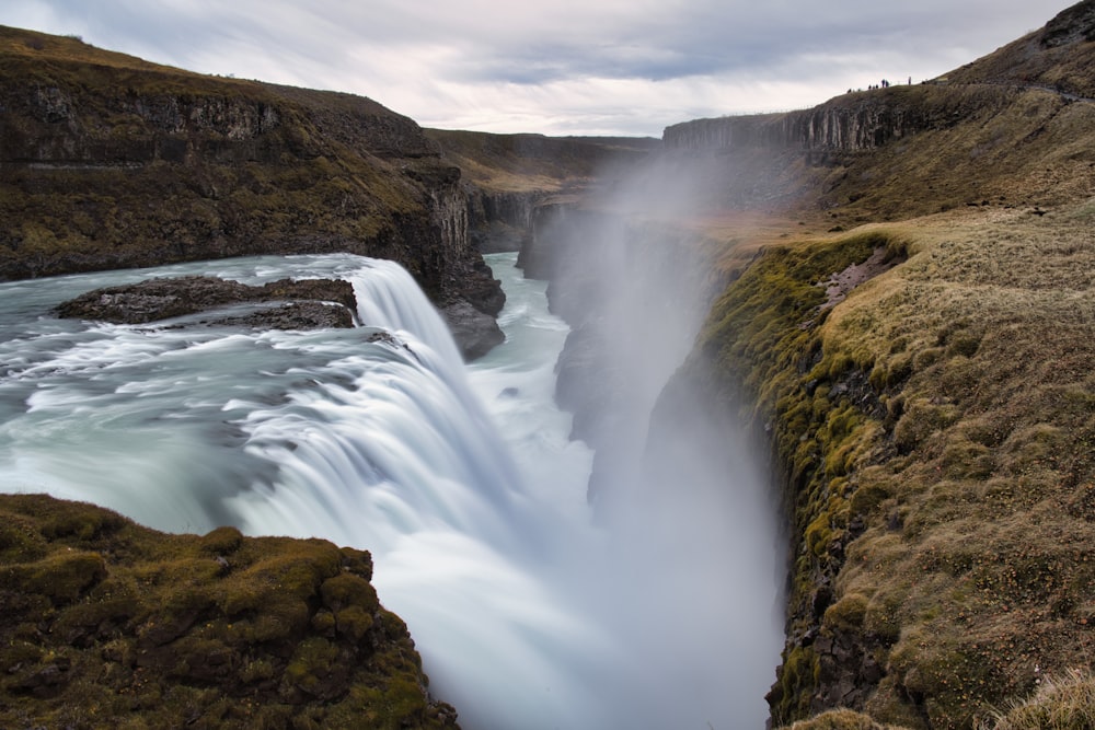 a waterfall in a rocky place