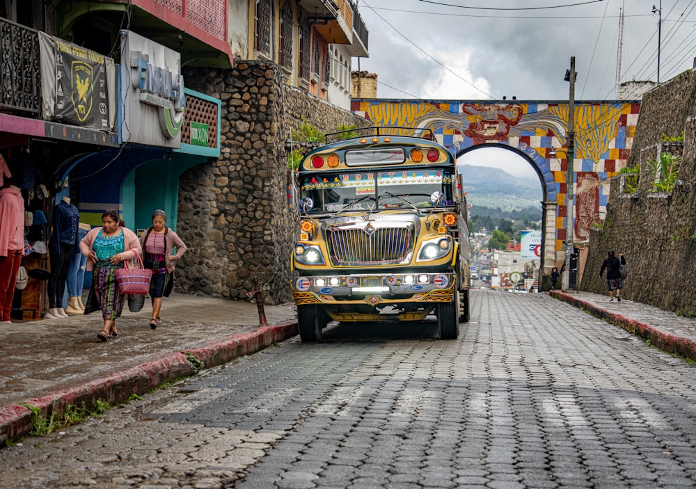 a yellow bus on a street