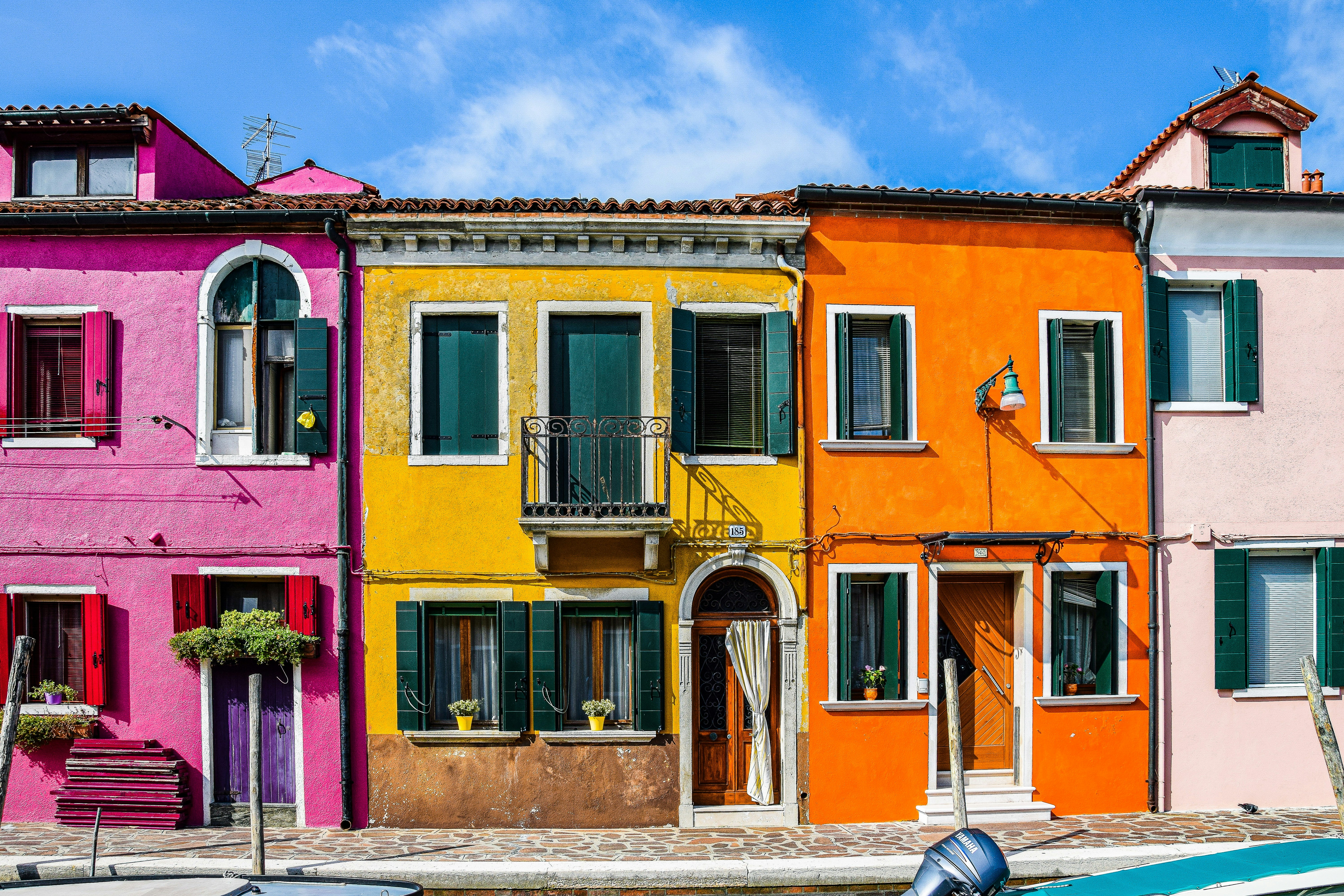 A row of colorful buildings photo – Free Burano Image on Unsplash