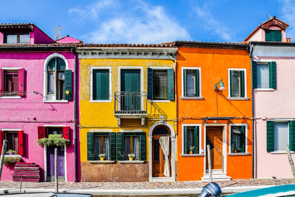 a row of colorful buildings