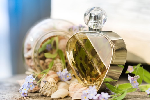 a glass jar with a plant inside