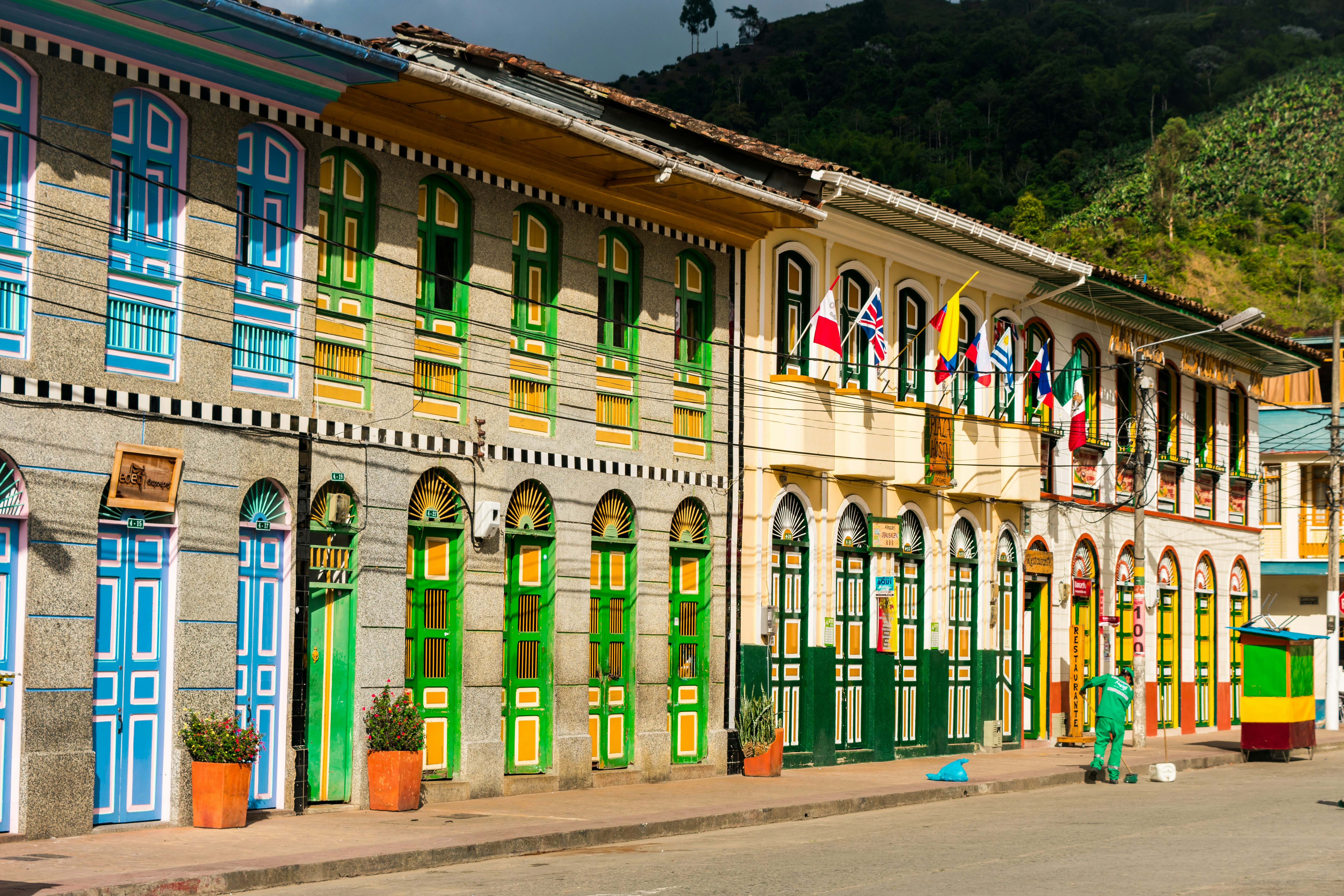 a building with flags on the roof, 