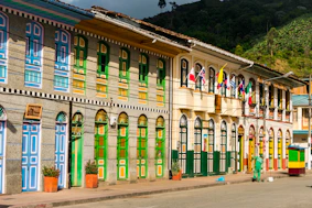 a building with flags on the roof