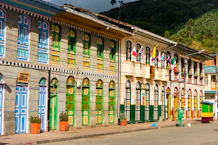 a building with flags on the roof