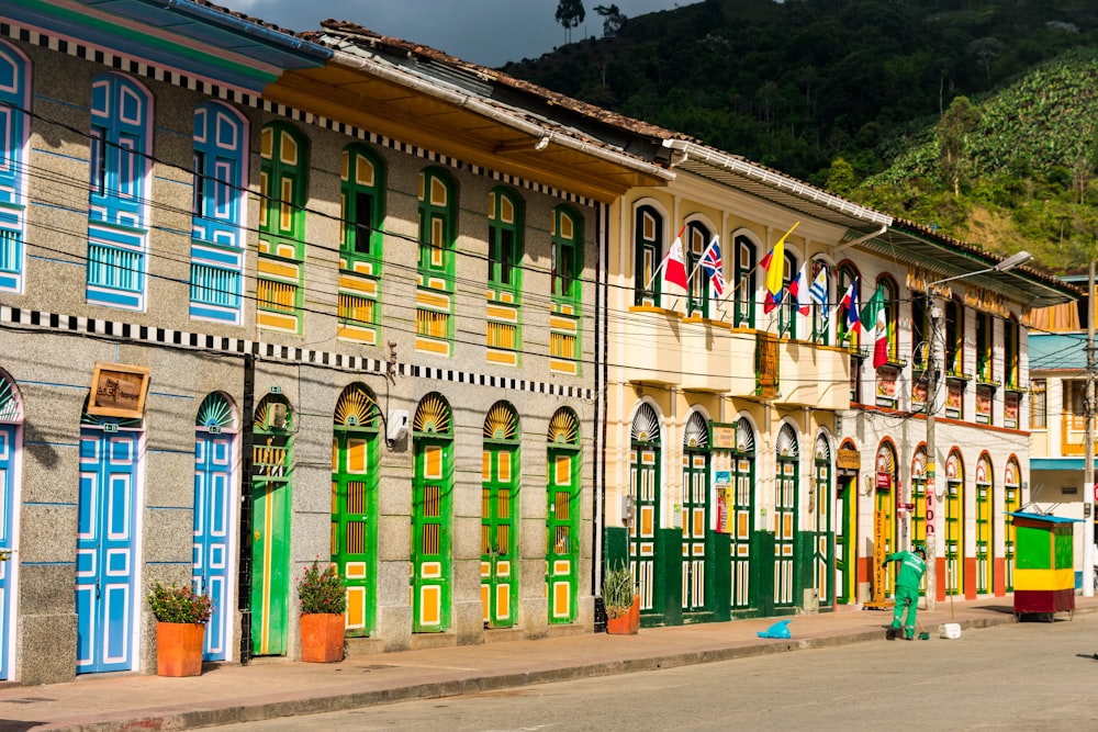 a building with flags on the roof