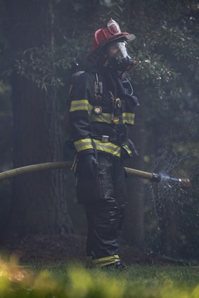 a firefighter putting out a fire