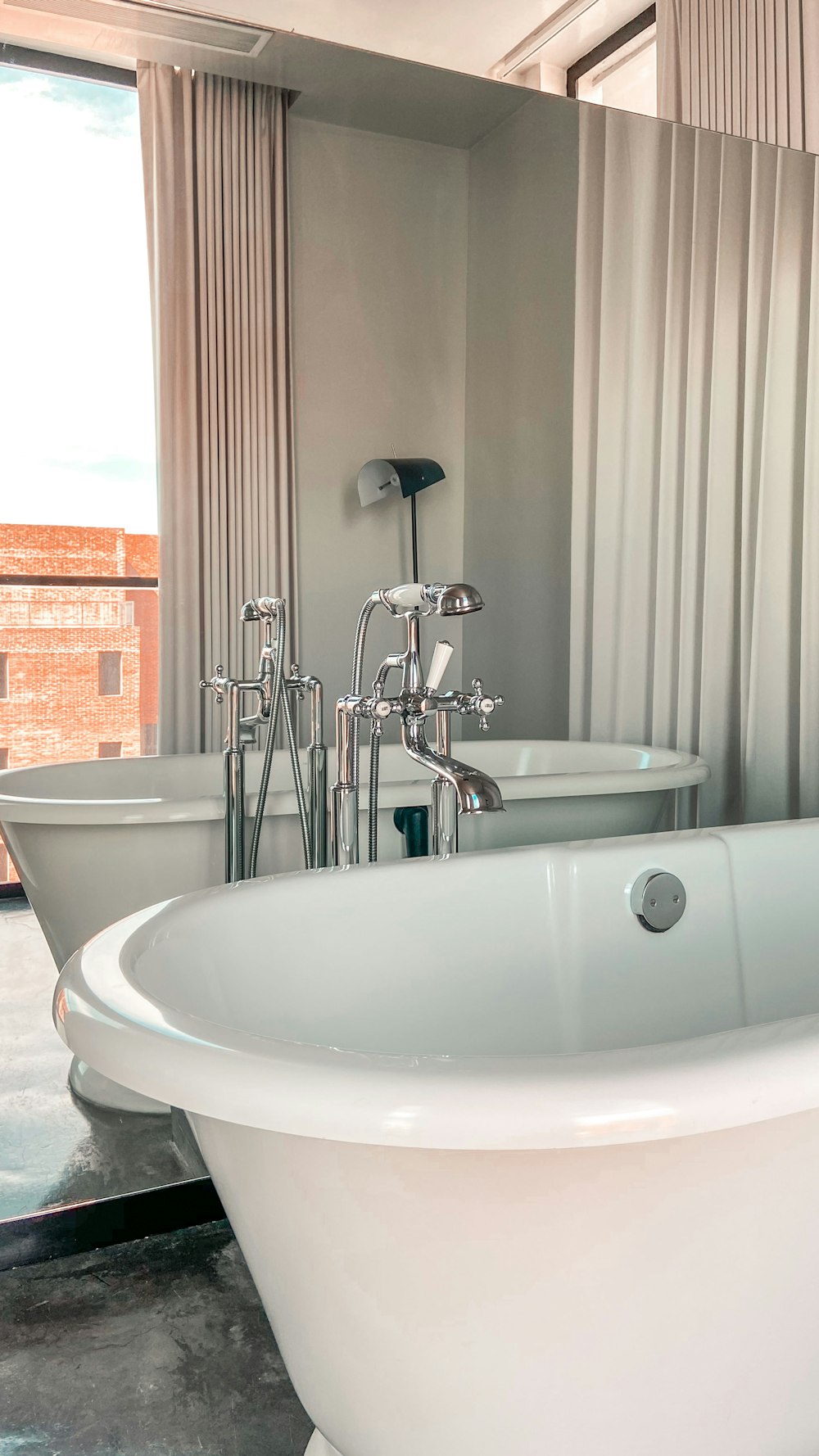 a bathroom with a tub and sink