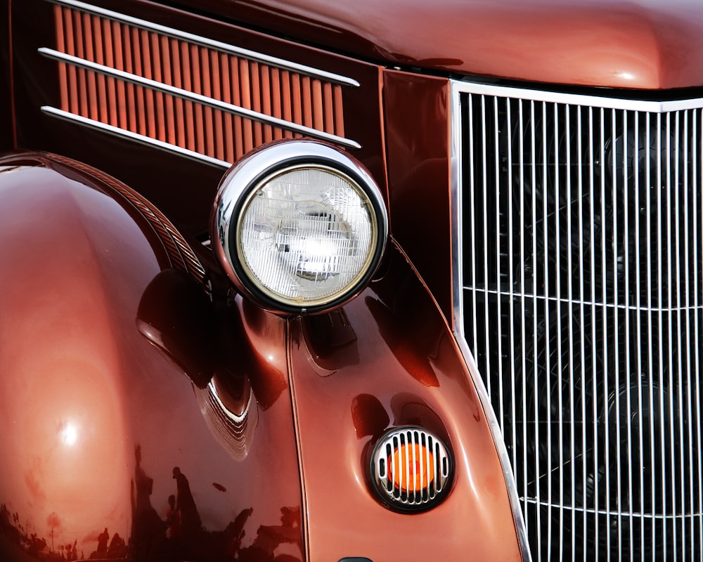 a close up of a car's headlight