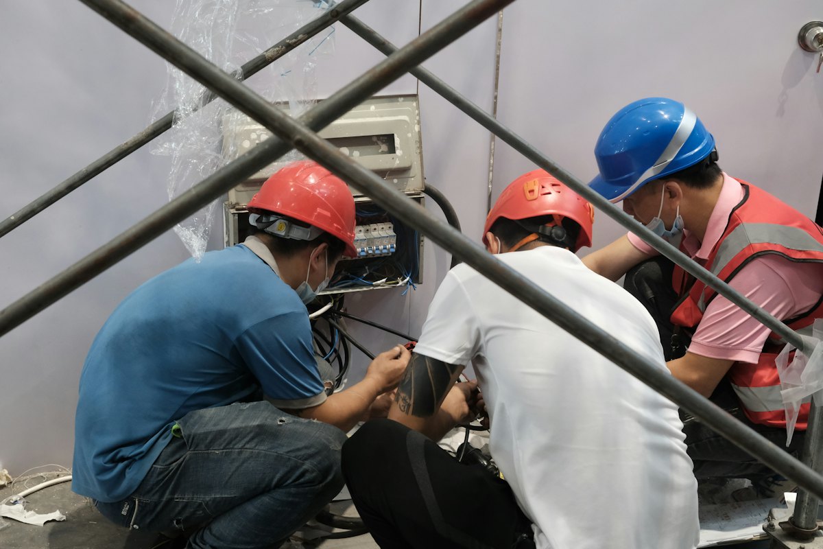 Construction workers in hard hats on a job site