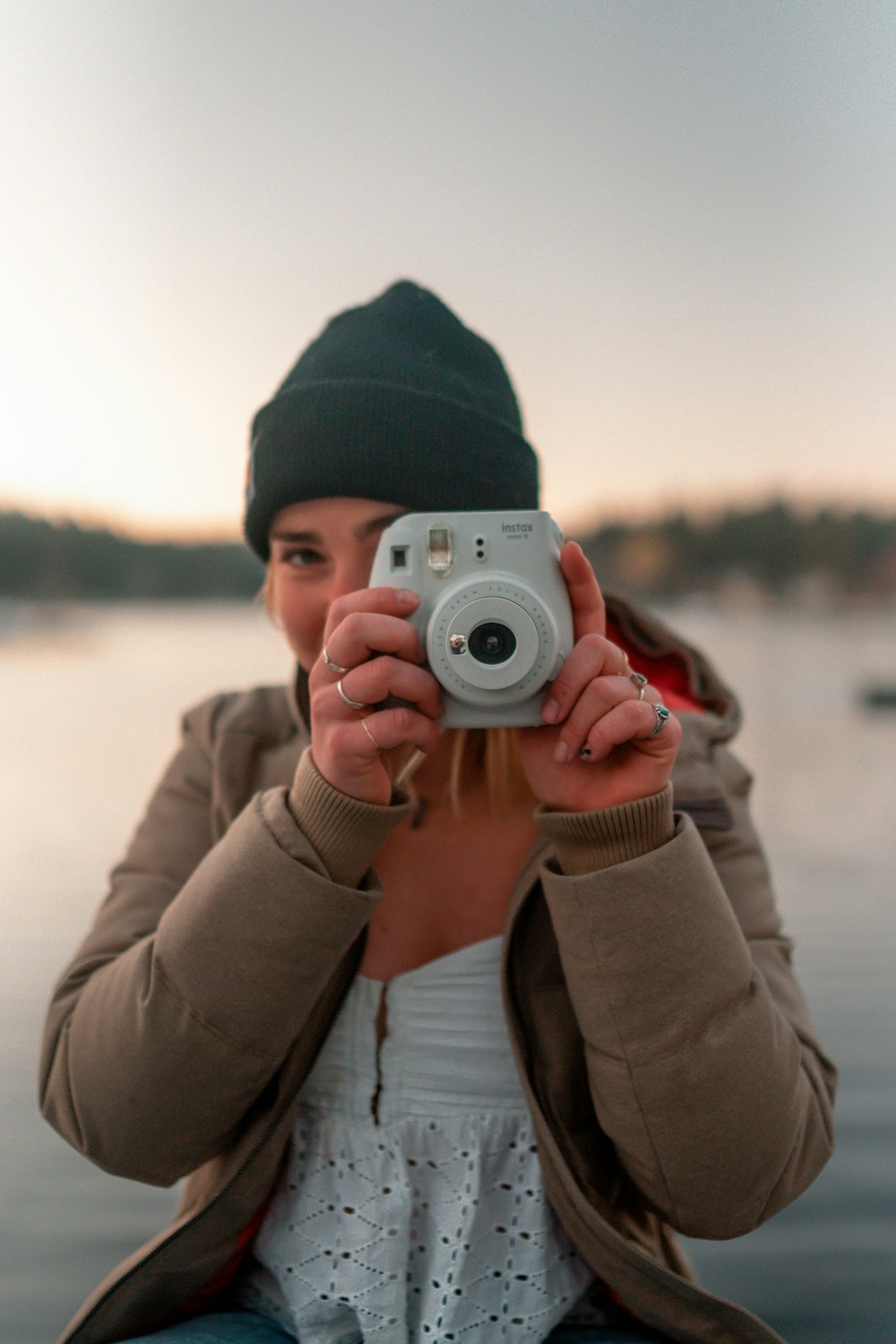 a person holding a camera