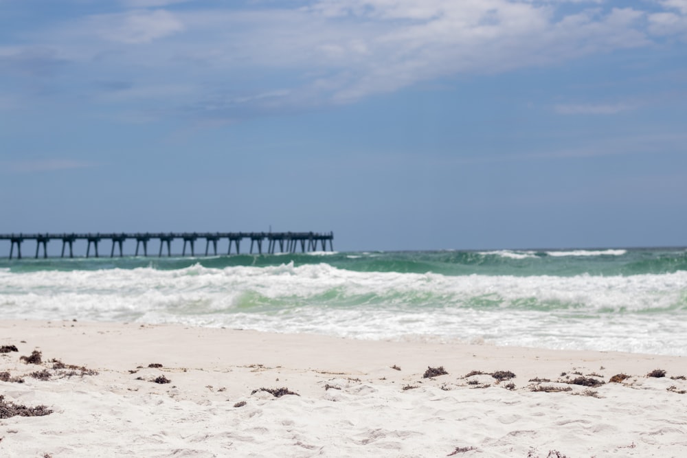 a beach with waves crashing