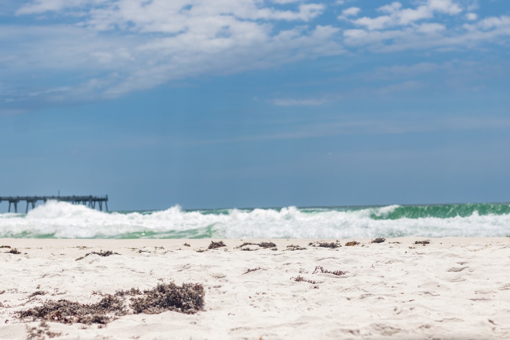 a beach with waves crashing