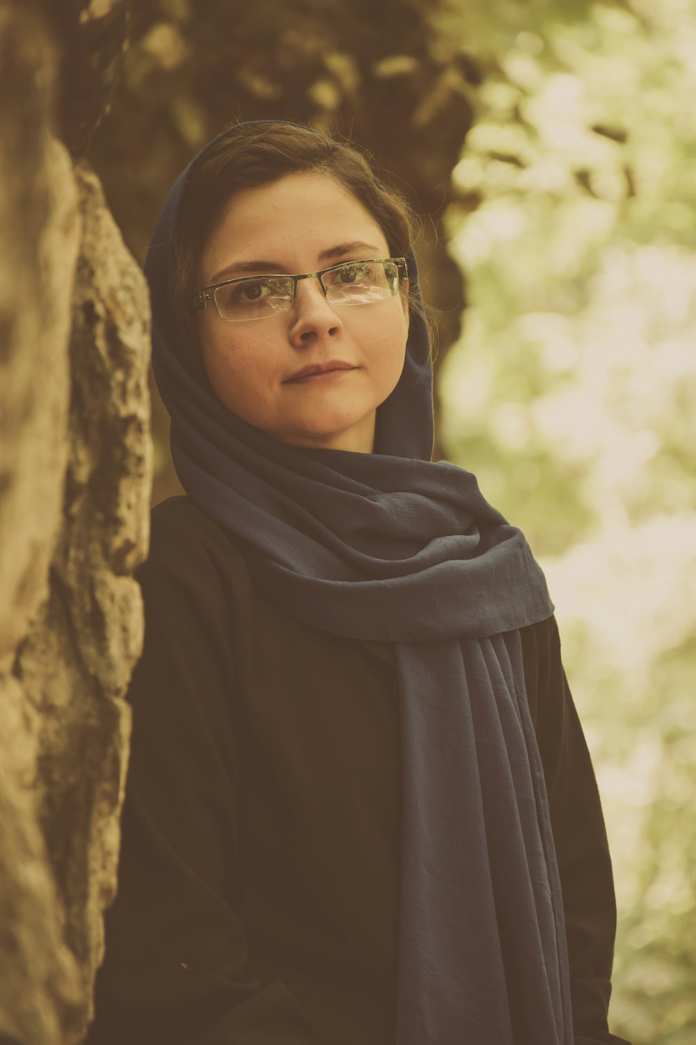 a woman wearing glasses