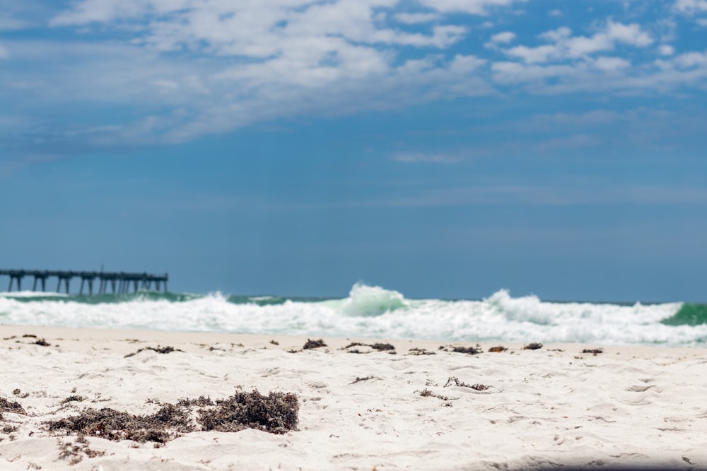 a beach with waves crashing