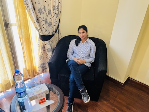 A patient comfortably resting in their favorite chair, surrounded by personal mementos.