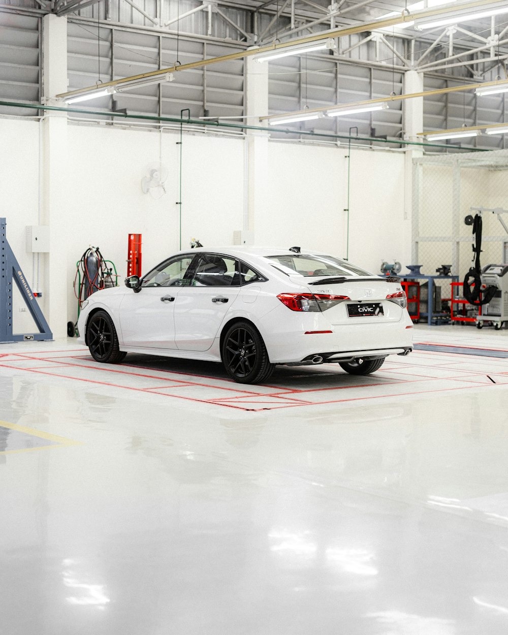 a white car parked in a garage