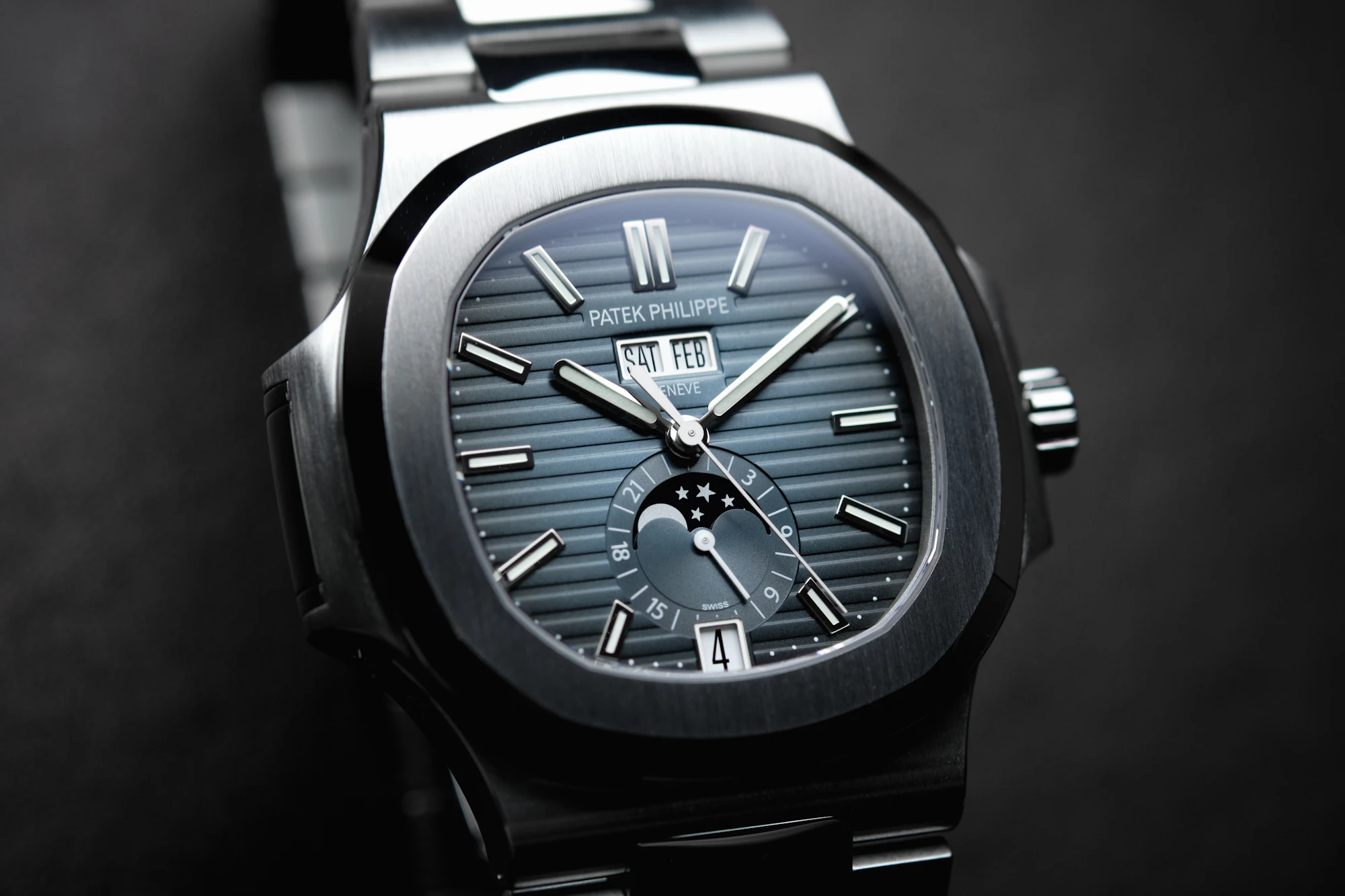 Luxury steel sports watch on the wrist