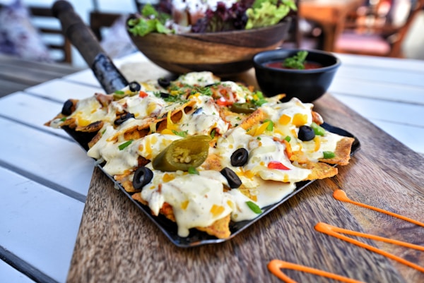 A pizza with vegetables and cheese