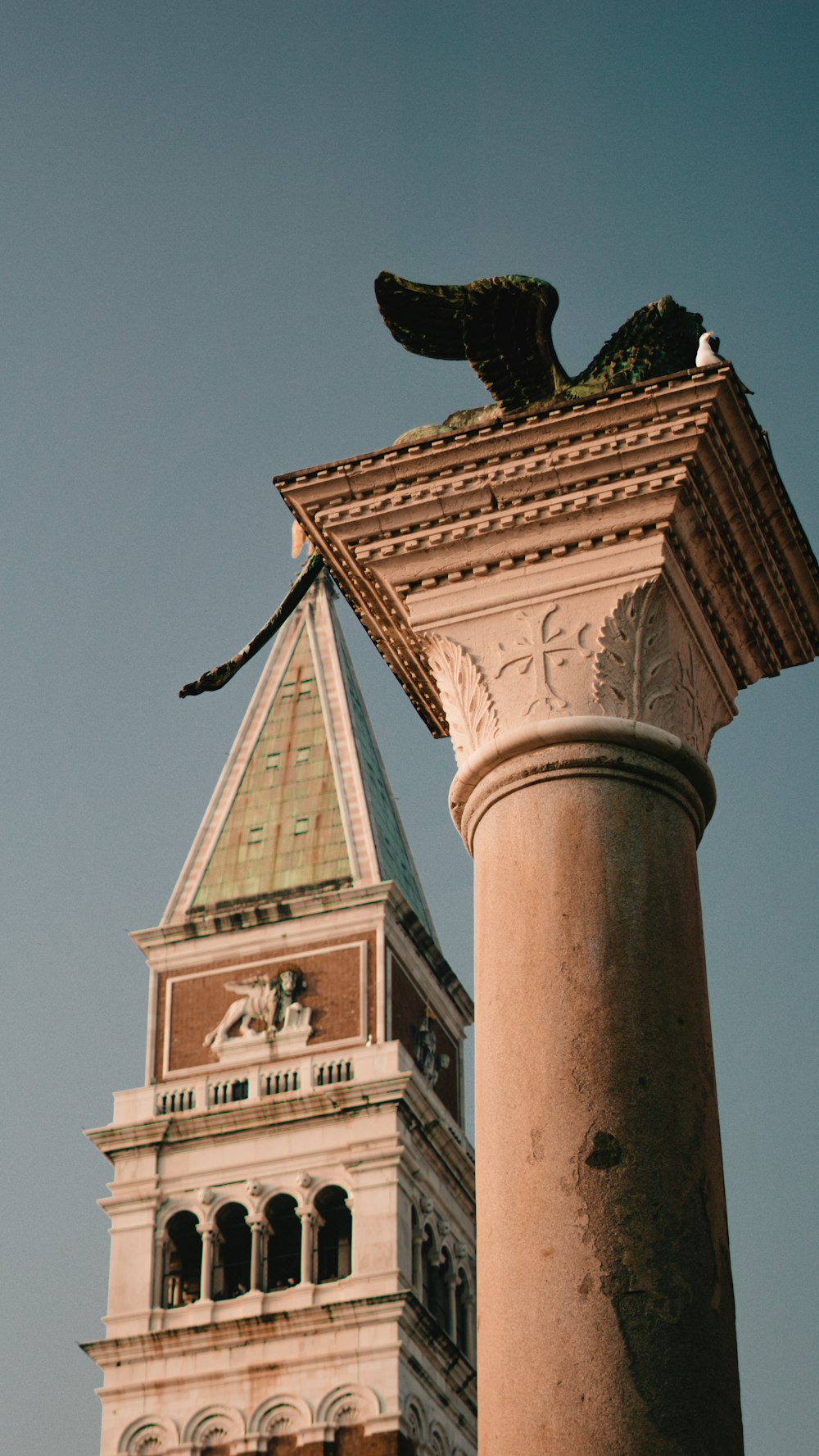 a statue on top of a building