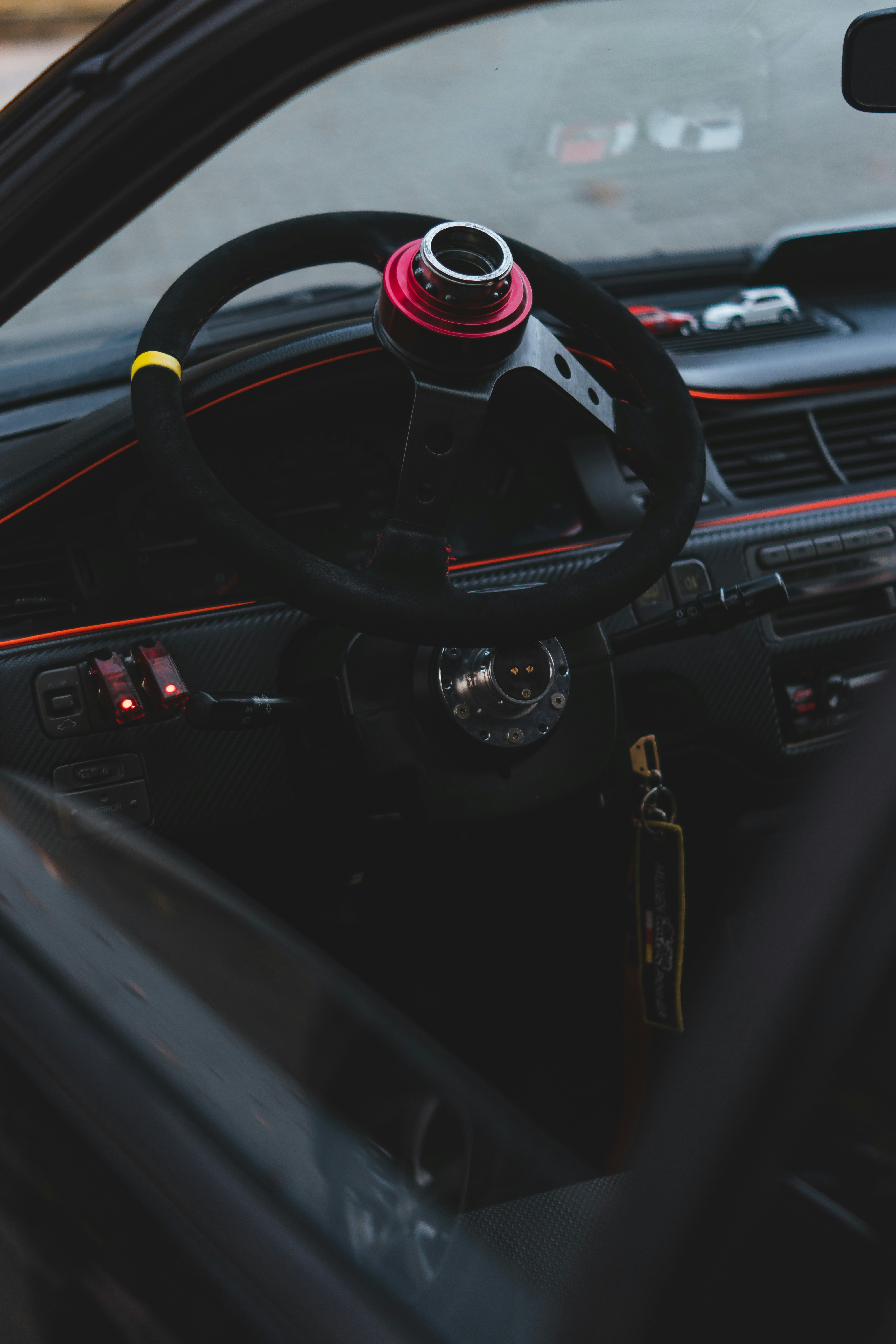 a steering wheel and dashboard of a car