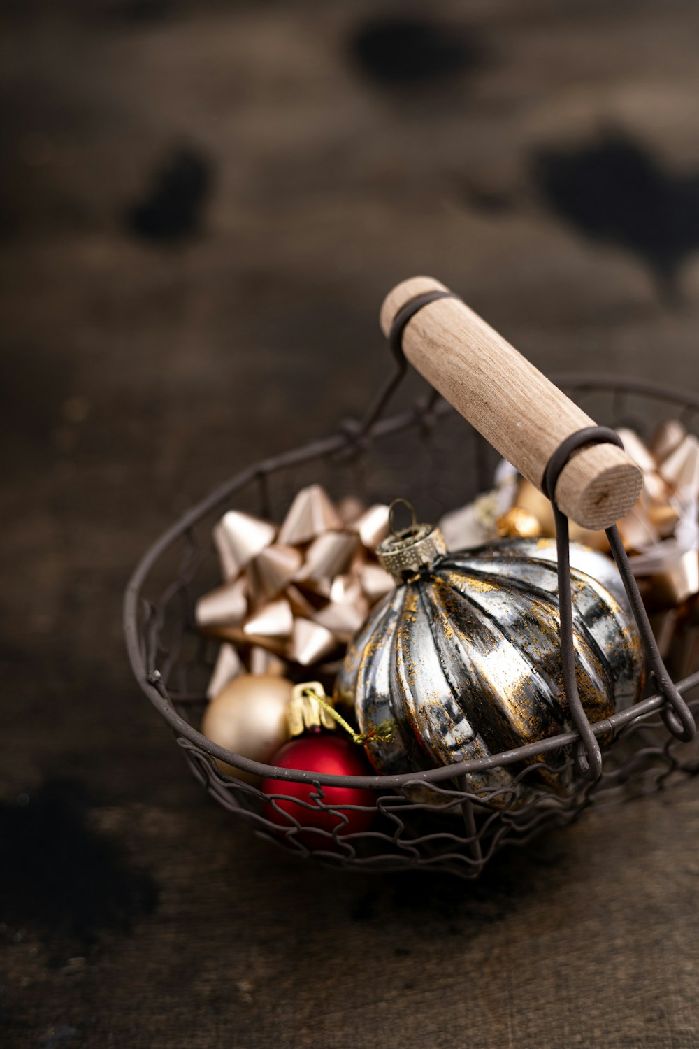 a basket of nuts and a wooden spoon