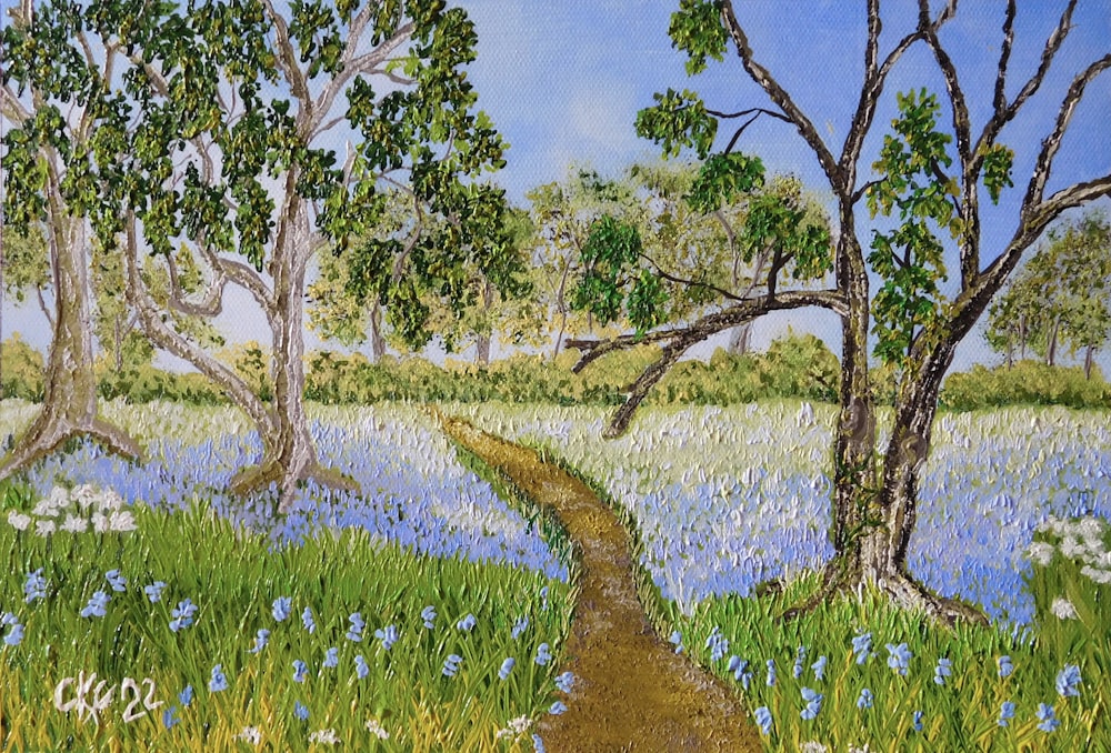 a river with trees and flowers