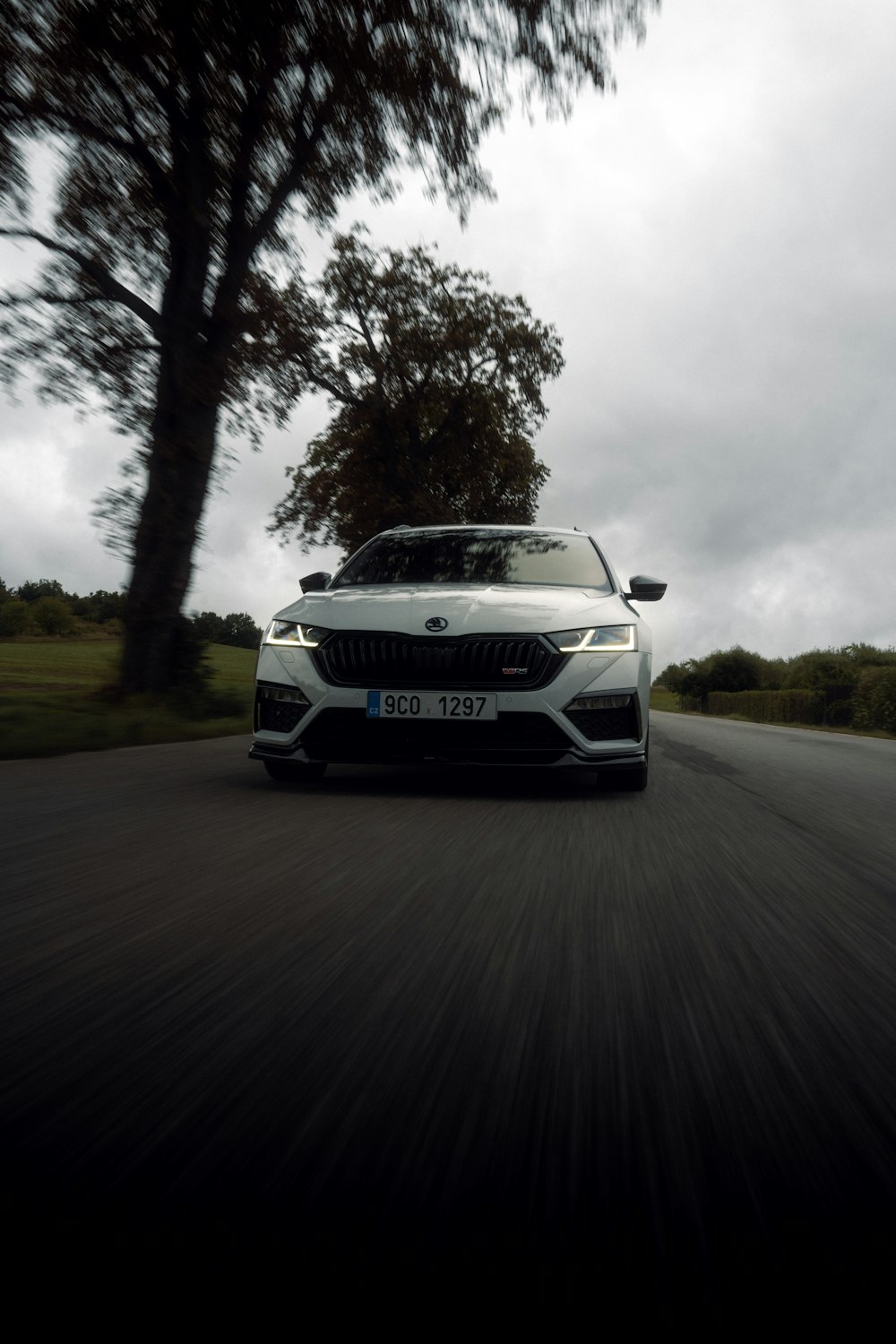 a white car on a road