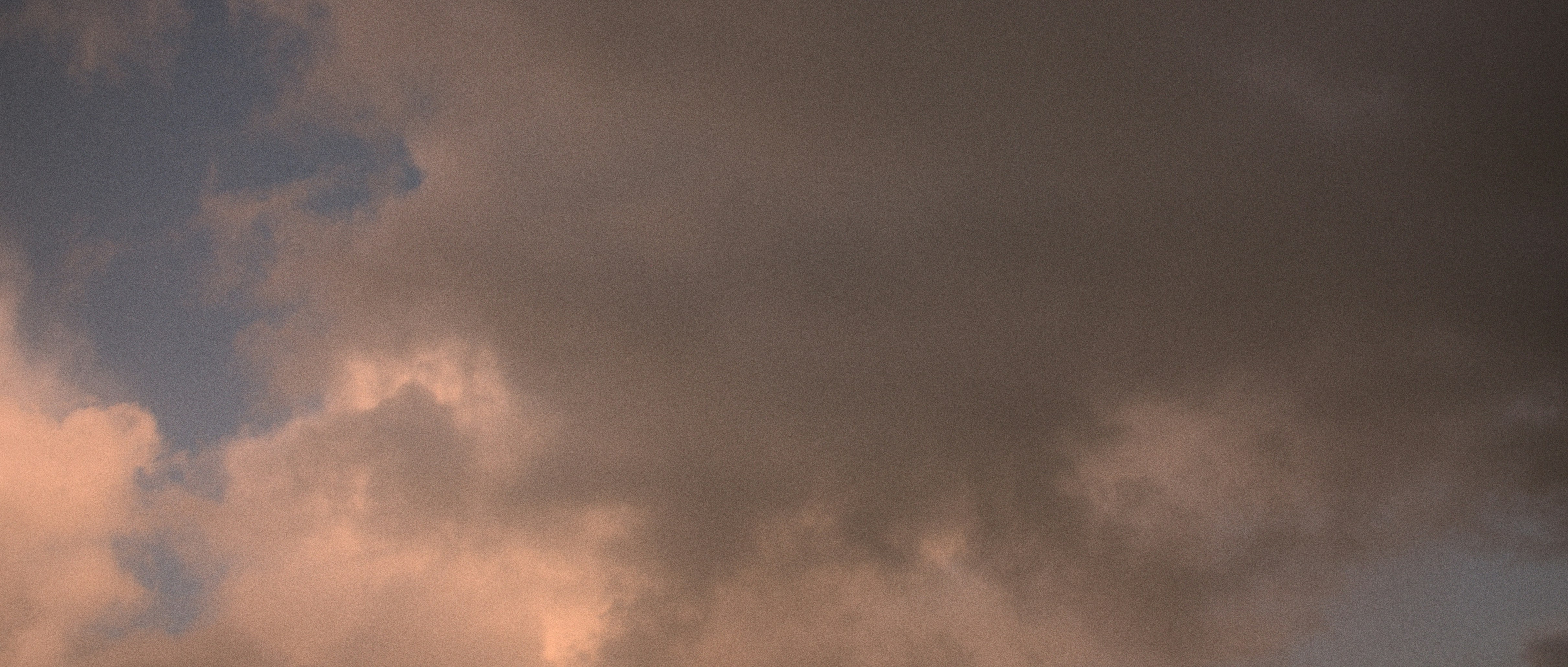 a cloudy sky with a few clouds