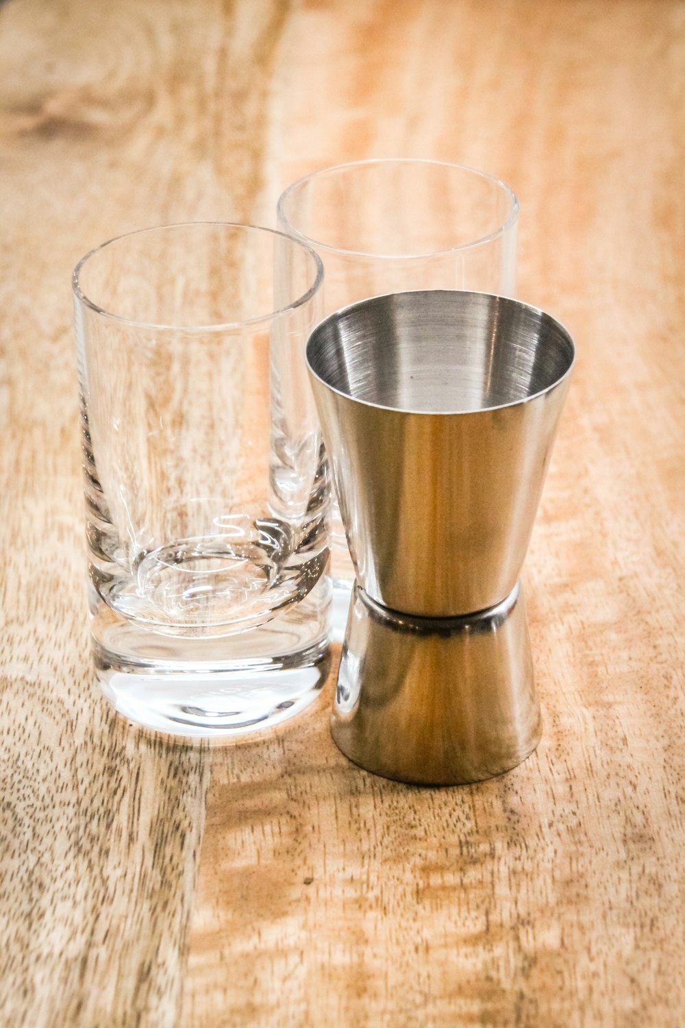 a couple of glasses on a table