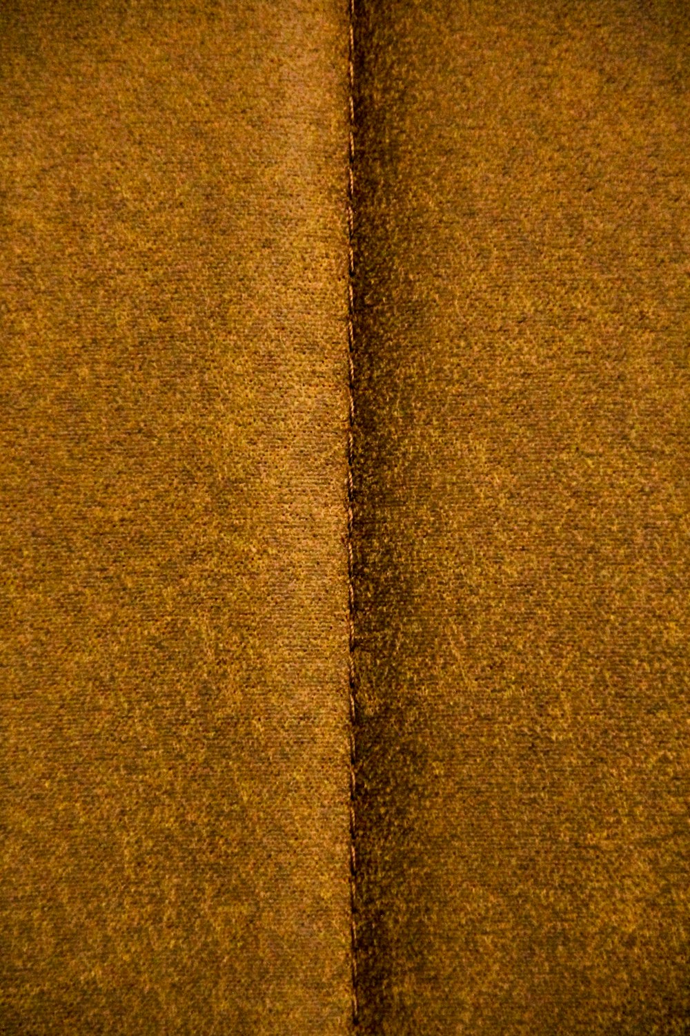 a close up of a yellow surface