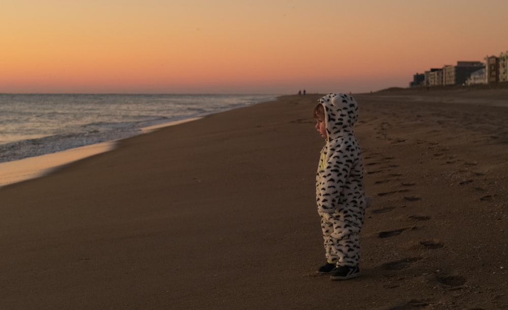 a man standing on a beach