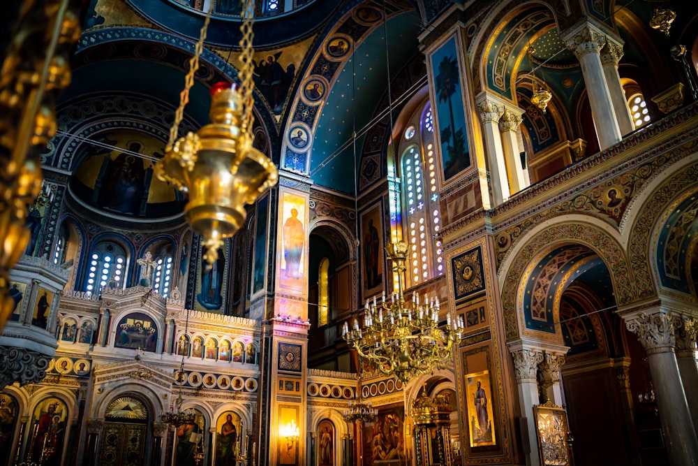 a large ornate building with chandeliers and a chandelier