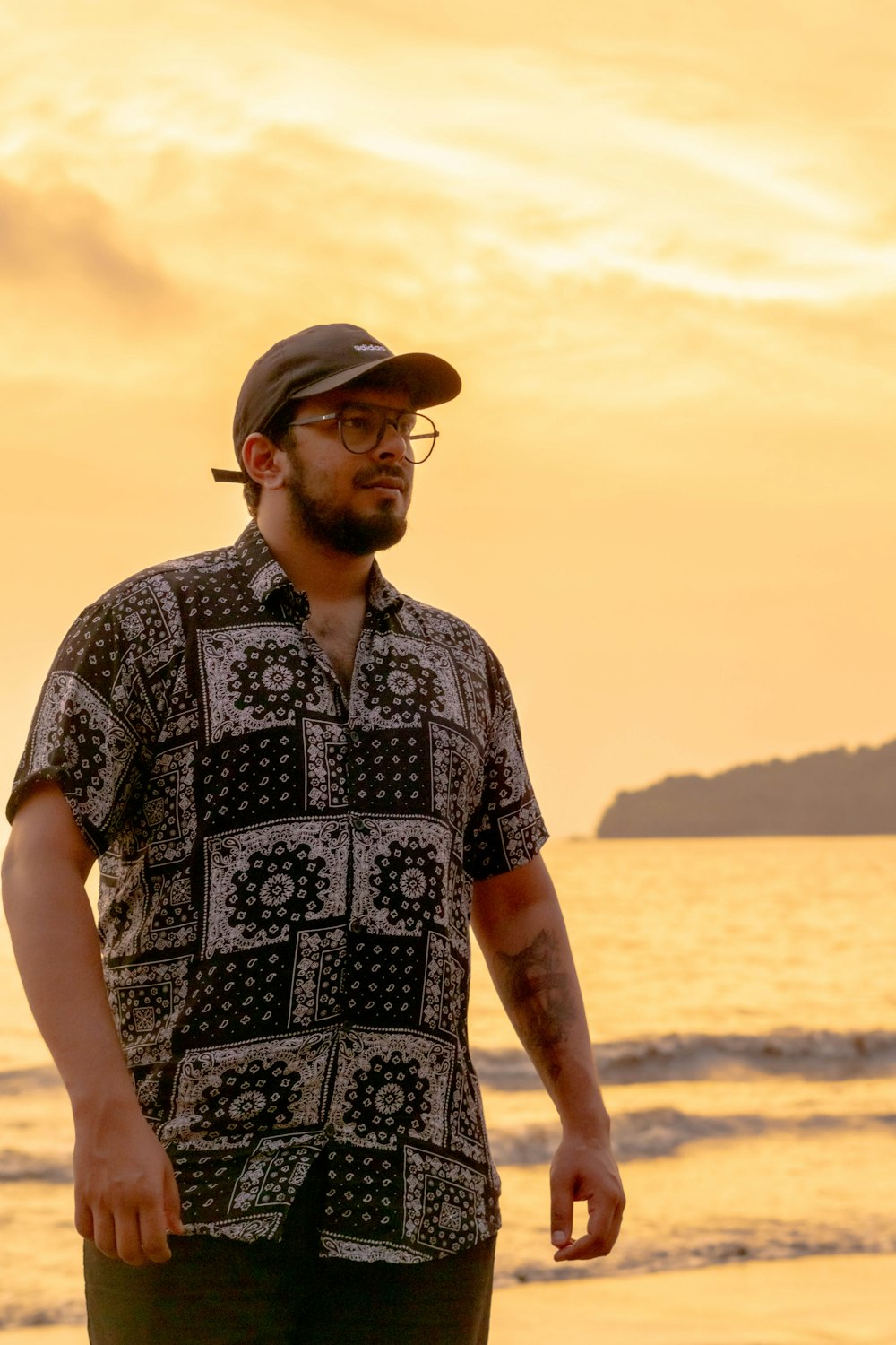 a man standing on a beach