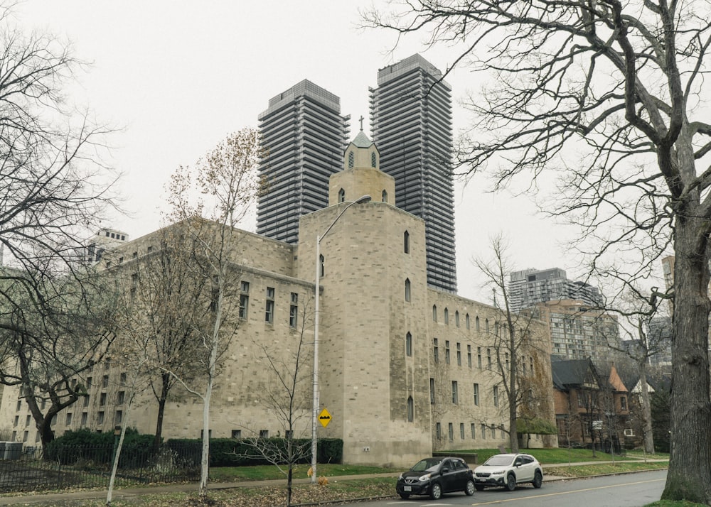 a large stone building with a dome and towers