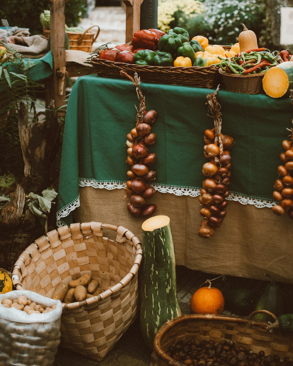 a group of baskets full of vegetables