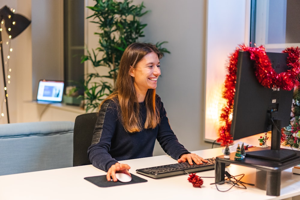 a woman sitting at a desk