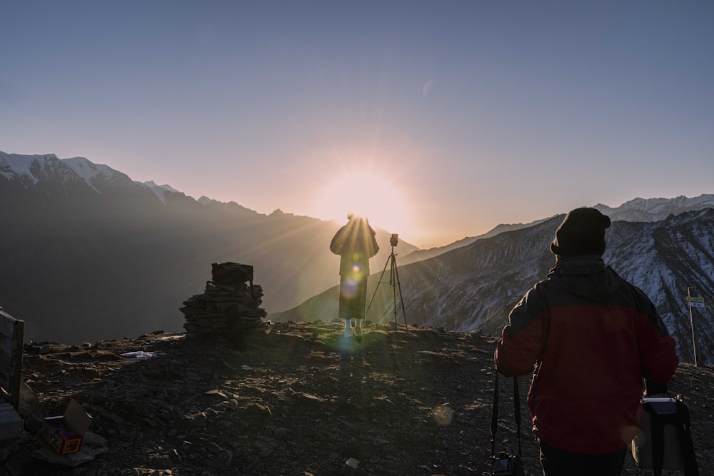 a person standing on a mountain