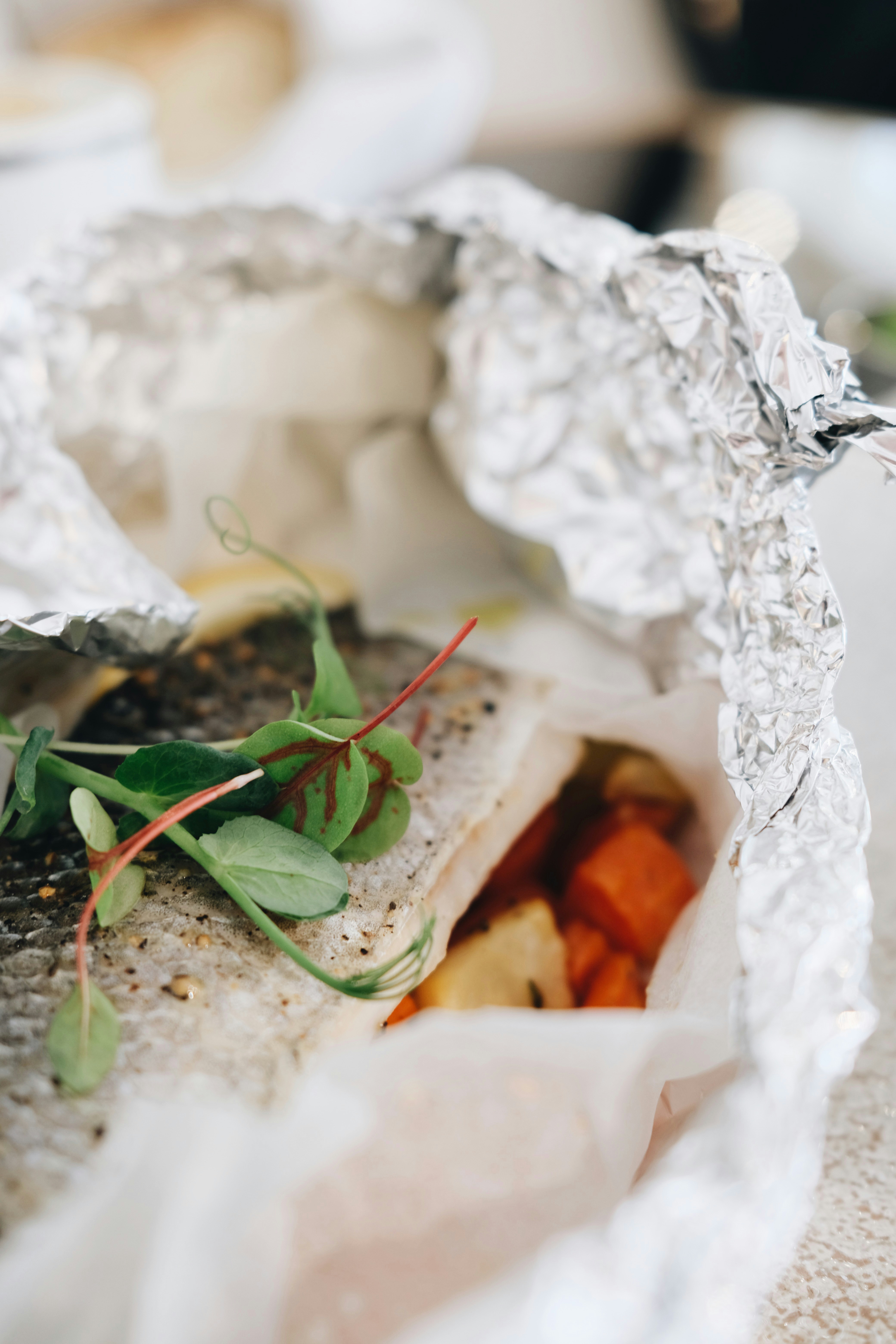 a sandwich with carrots and lettuce