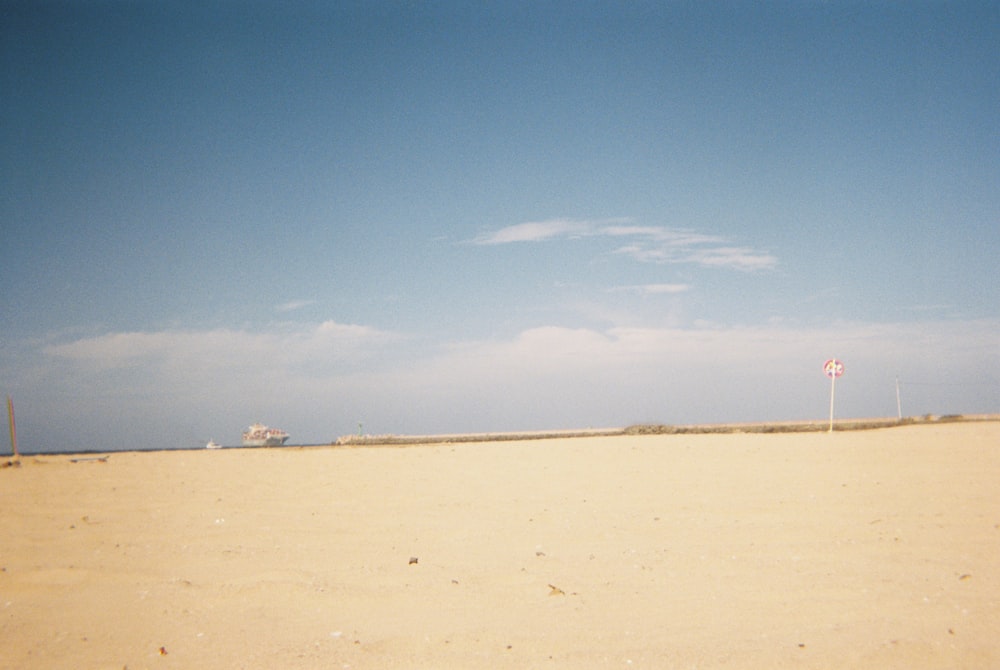 a sandy area with a blue sky