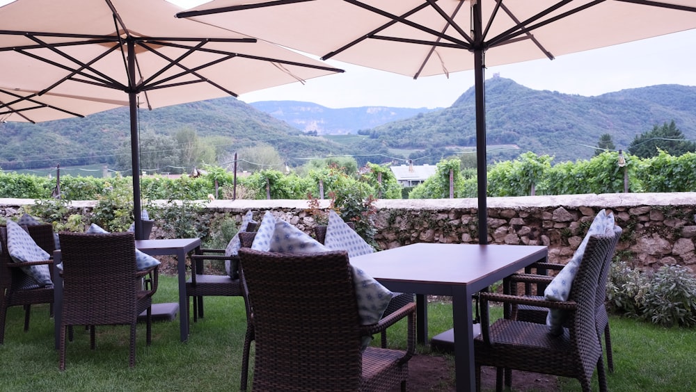 a patio with a table and chairs