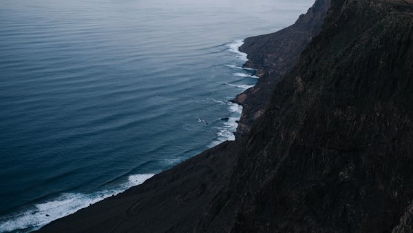 Black cliffs falling to the ocean — Lanzarote, Spain